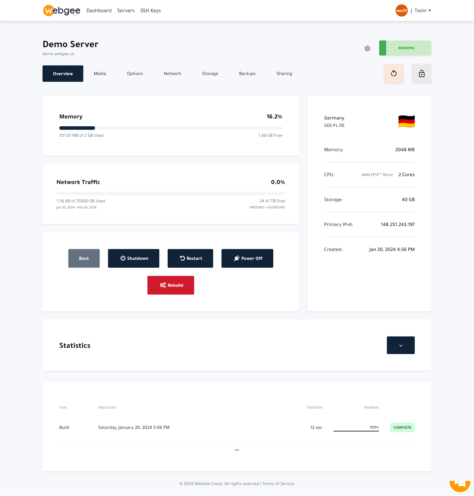 The Cloud Console server overview showing a running server with memory, network traffic, power controls, the Rebuild button and a completed Build task that took 12 seconds
