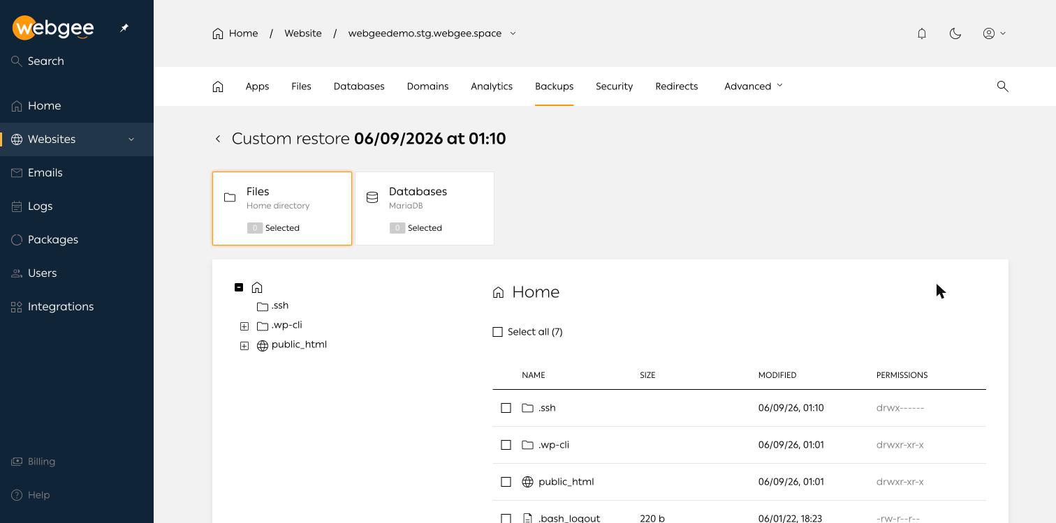 La pantalla de restauración personalizada de WordPress Cloud con las pestañas Archivos y Bases de datos y un árbol de archivos que muestra public_html, con tamaños, fechas de modificación y permisos